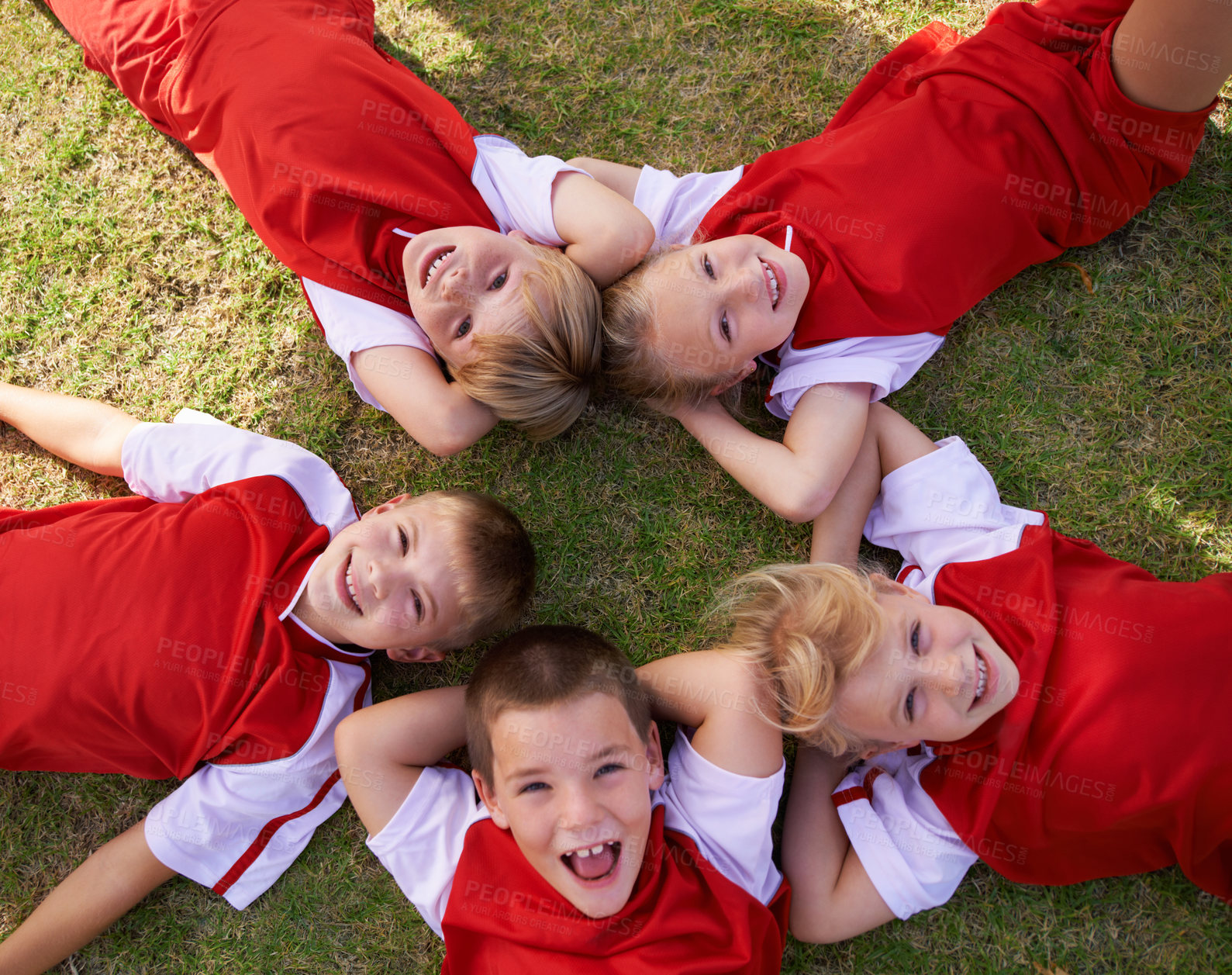 Buy stock photo Kids, soccer team and portrait with smile, boys and girls with high angle, support or solidarity. Energy, sports and friendship, together and happy for win, ready for game and physical activity