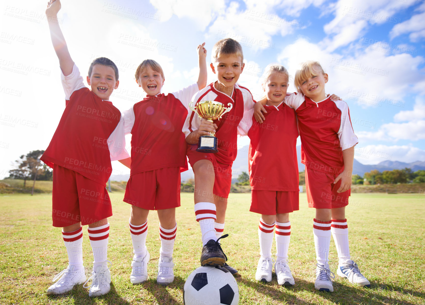 Buy stock photo Children, soccer team and trophy for success in portrait, sports and fitness achievement in outdoors. People, kids and happy for collaboration on field, teamwork and partnership or support in victory