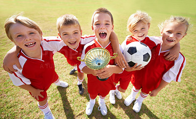 Buy stock photo Kids, soccer team and portrait with cup, boys and girls with victory, support or solidarity. Achievement, sports and friendship, together and happy for win, ready for game or physical activity
