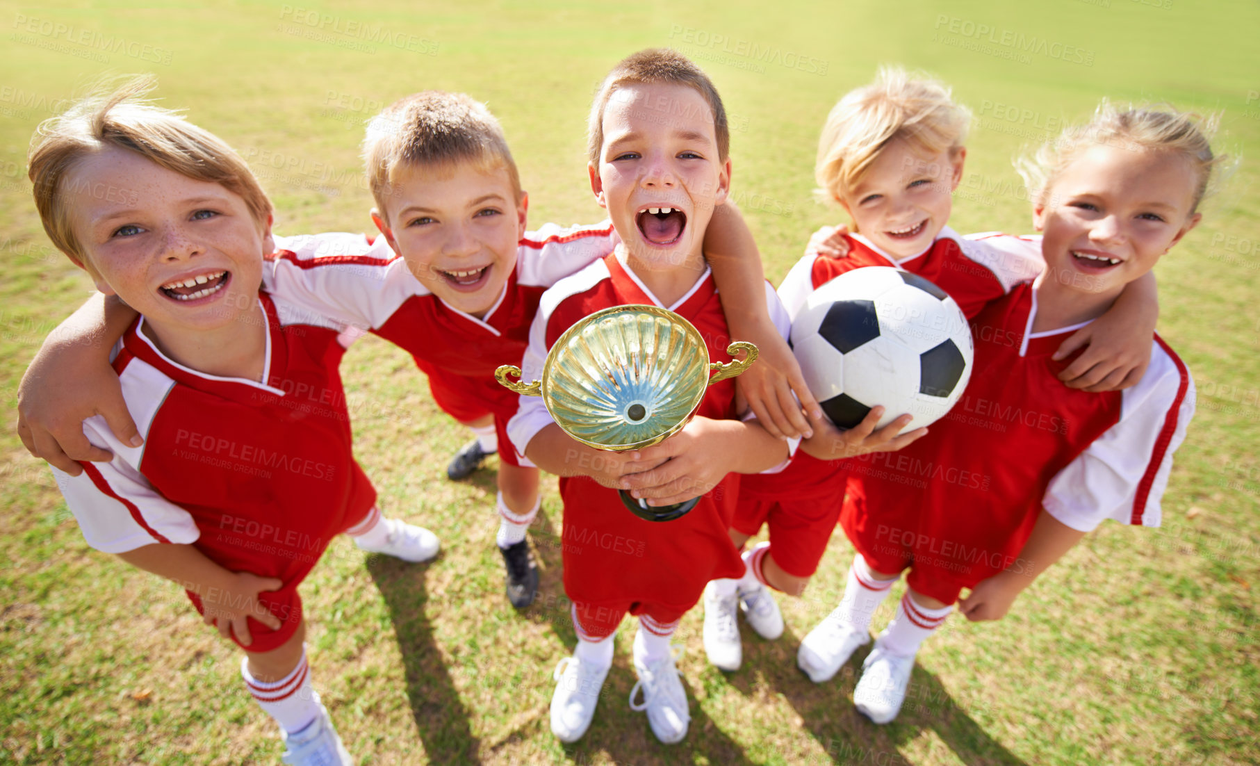 Buy stock photo Kids, soccer team and portrait with cup, boys and girls with victory, support or solidarity. Achievement, sports and friendship, together and happy for win, ready for game or physical activity
