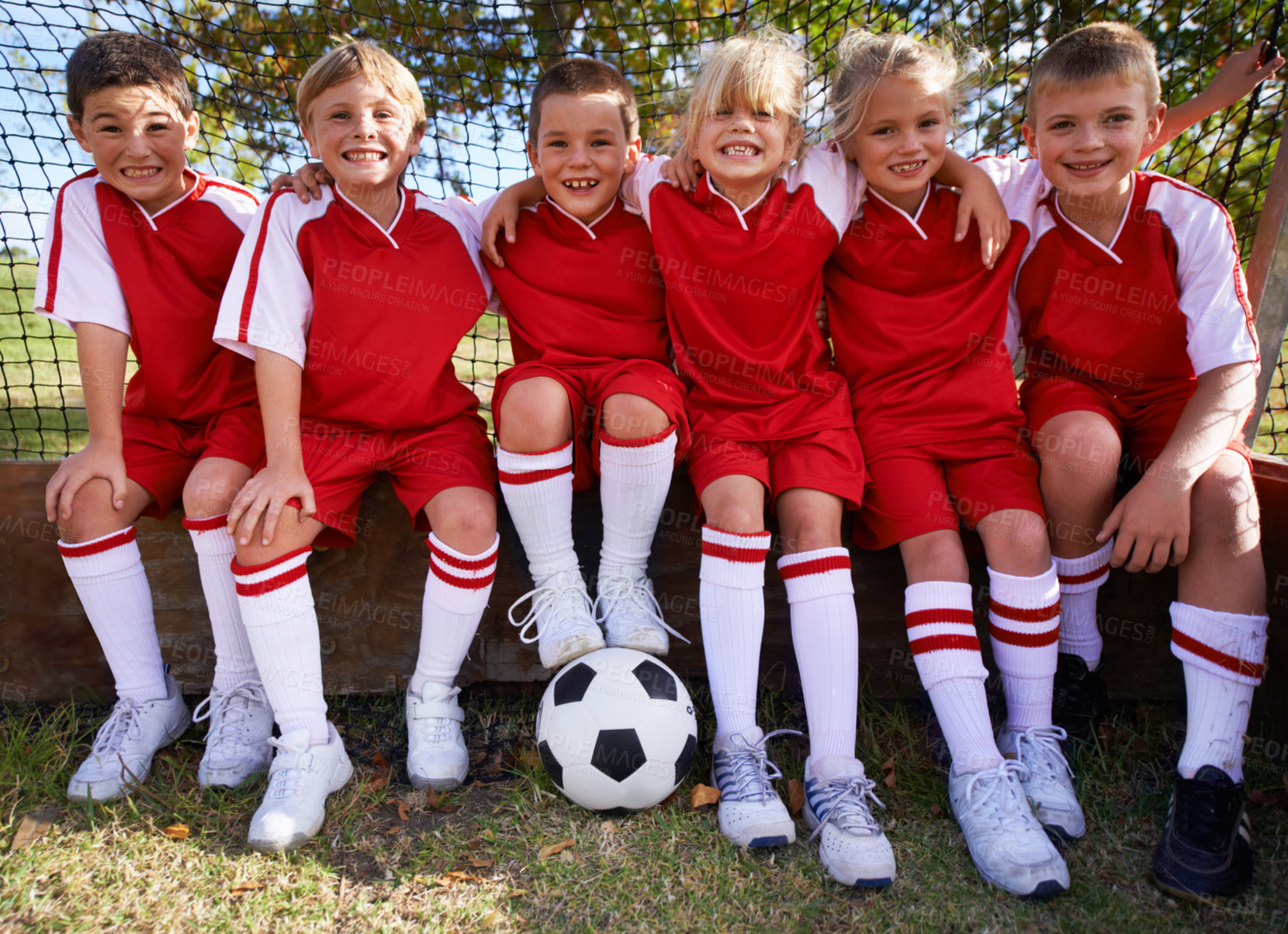 Buy stock photo Kids, soccer team and portrait with ball, boys and girls with players, support or solidarity. Energy, sports and friendship, together and happy for win, ready for game or physical activity 
