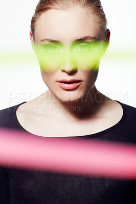Buy stock photo Woman, beauty and light streak with makeup, creativity and glow, skin and headshot isolated on white background. Art deco, neon color and shine with portrait, cosmetic or fashion with model in studio