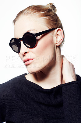 Buy stock photo Woman, sunglasses for beauty or fashion, confidence and wellness with protection from sun on white background. Black eyewear, casual clothes and pose in studio with makeup, eye care and cosmetics