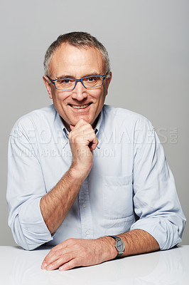 Buy stock photo Portrait, business and mature man with a smile, confident and manager against a studio background. Face, happy male person and employee with happiness, skills and professional with career and success