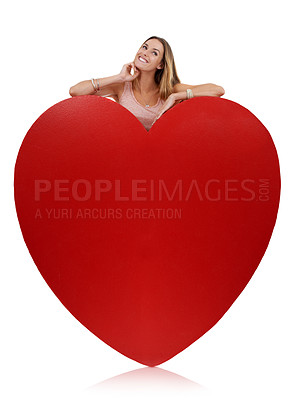 Buy stock photo Heart, in love and woman happy with freedom and funny excited feeling behind sign. Model, white background and comic young person with happiness, joy and smile for romance and beauty isolated