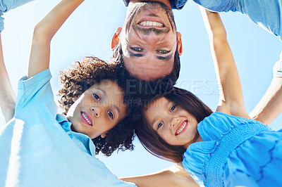 Buy stock photo Hug, blue sky portrait and happy kids, father and children bonding, support and family circle for care, solidarity or love. Group, bottom view and people together for Fathers Day, happiness and trust
