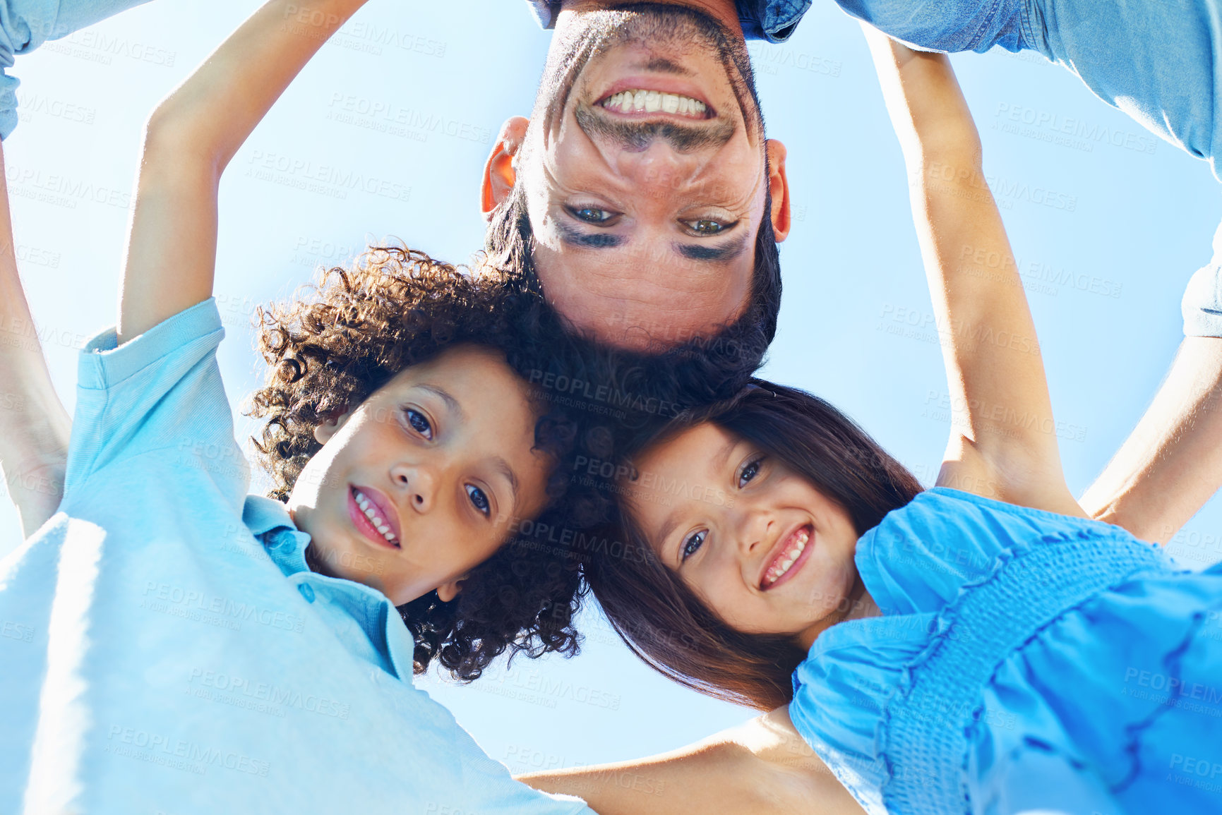 Buy stock photo Hug, blue sky portrait and happy kids, father and children bonding, support and family circle for care, solidarity or love. Group, bottom view and people together for Fathers Day, happiness and trust