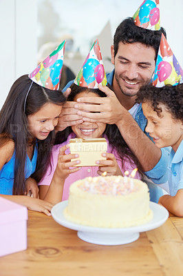 Buy stock photo Birthday cake, kid and gift with covered eyes, surprise and happy family for celebration, siblings and dad. Singing, smile and love with presents, together and parent for childhood, party or home
