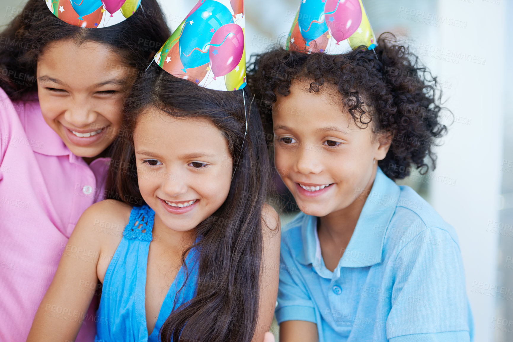 Buy stock photo Happy, birthday party and children with hats at their home for celebration and bonding together. Smile, excited and sweet young kids at event with friendship, youth and childhood at modern house.