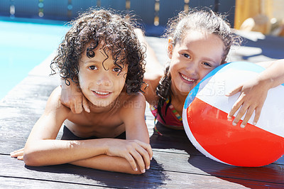 Buy stock photo Pool, smile and portrait of children with ball for swimming lesson, activity or hobby fun. Happy, summer and kids with equipment for skill, playing or tricks in water of outdoor backyard at home.