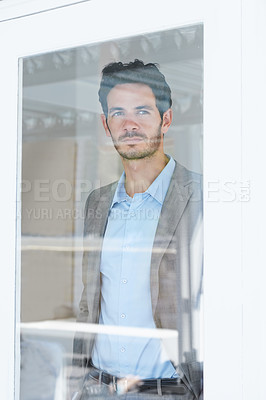 Buy stock photo Man, serious by window and thinking of business ideas, brainstorming or reflection with insight and inspiration. Corporate professional, mission with decision and future in company with planning