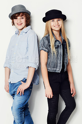 Buy stock photo Portrait of two fashionable young kids posing in the studio