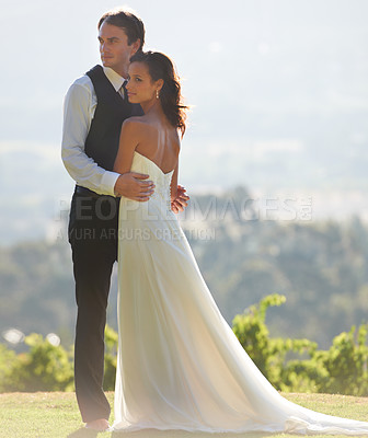 Buy stock photo A groom embracing his new wife