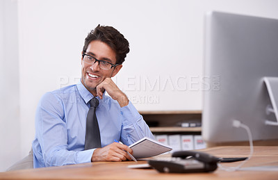 Buy stock photo Businessman, thinking and smile for notes in notebook, contemplating ideas and pride in workplace. Male professional, planning and agenda for schedule or strategy, journal and solution or information