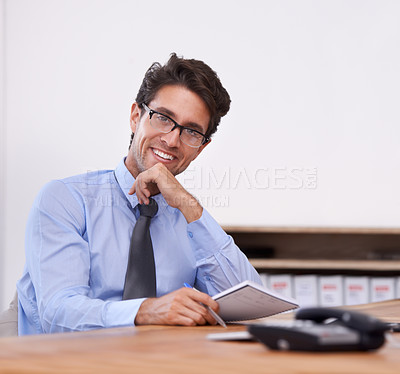 Buy stock photo Businessman, smile and information in notebook, portrait and contemplating company future and notes. Male professional, planning and agenda for schedule or strategy,  journal and solution or ideas