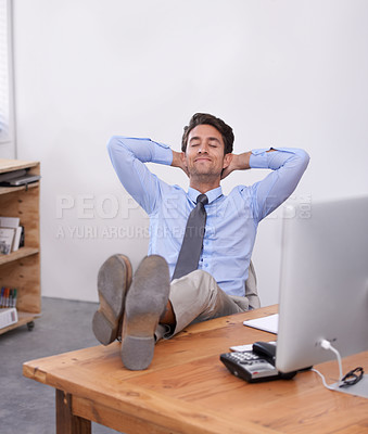 Buy stock photo Nap, relax or happy man in office on break for mental health, pride or wellness at his desk or workplace. Calm, business or employee sleeping with smile or hand behind his head stretching or resting