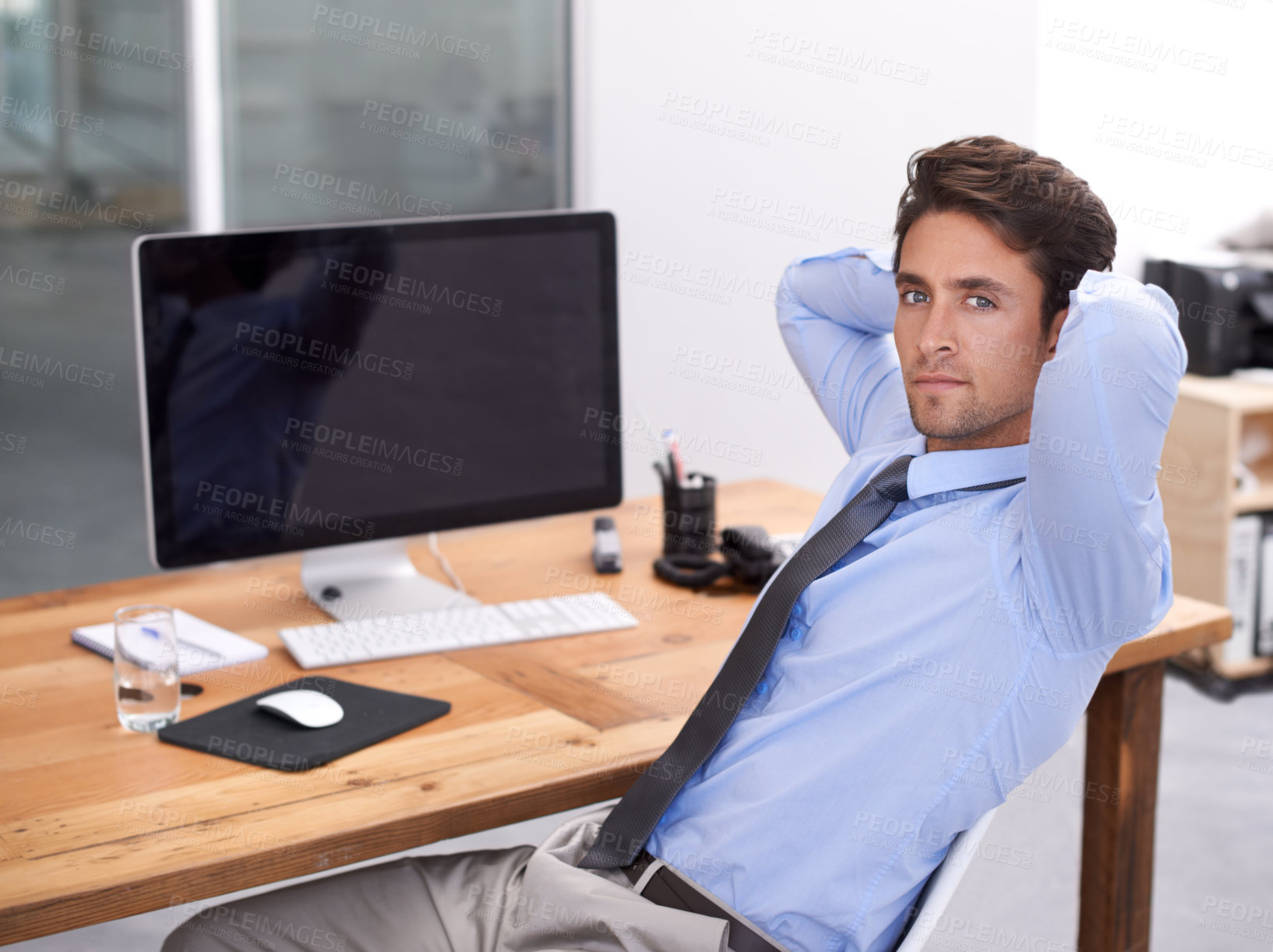 Buy stock photo Businessman, portrait and relaxing by computer screen, company and feedback on report in workplace. Male professional, technology and face for connection, internet and entrepreneur by mockup space