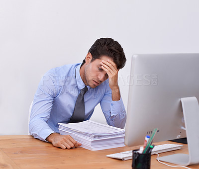 Buy stock photo Stress, business man and headache with paperwork from corporate career at office desk. Anxiety, lawyer deadline and burnout of a male professional with notes, contracts and report with fatigue