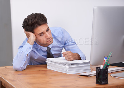 Buy stock photo Business man, burnout and fatigue with paperwork, paralegal in office and stress about job. Overworked, bored and tired employee at desk with documents, exhausted and not interested in work    