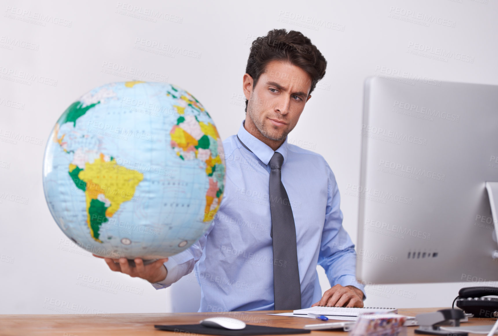 Buy stock photo Travel, international or confused businessman with planet, earth or worldwide destination for trip in office. Agent, computer or professional person with map of planet for geography or journey choice