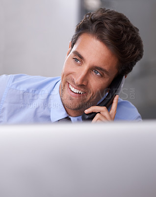 Buy stock photo Businessman, phone call and smile on landline in workplace, contact and consulting in office. Businessperson, professional and communication or discussion, technology and connection for networking