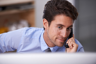 Buy stock photo Business man, phone call and consulting on landline in workplace, contact and conversation in office. Businessperson, professional and communication or discussion, technology and connection for info