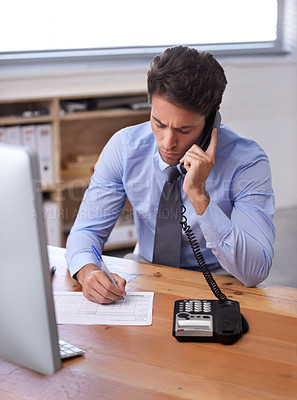 Buy stock photo Business man, phone call and writing notes on landline in workplace, contact and consulting in office. Male professional, planning and communication or discussion, technology and connection for info