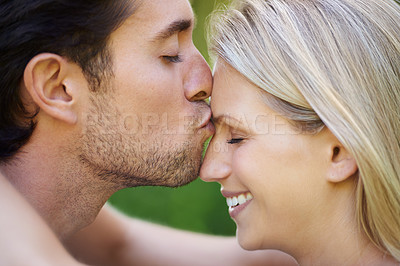 Buy stock photo Couple, man kiss woman with love, commitment and care outdoor, Valentines day and healthy relationship. Loyalty, respect and trust with partner, people are bonding with affection and connection