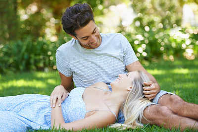 Buy stock photo Relax, smile or happy couple in park on date for peace, support or love in summer in nature together. Laugh, romantic man or woman with joy on outdoor holiday vacation for bond, travel or wellness