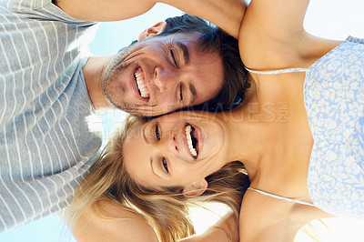 Buy stock photo Laughing, portrait or happy couple hug in outdoor on date for support or love in nature together. Low angle, romantic man or funny woman with smile on holiday vacation for bond, travel or wellness