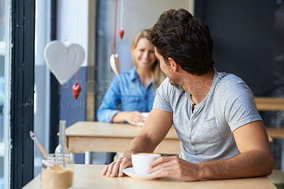 Buy stock photo Back, flirting or happy man in cafe with a coffee to relax with smile, morning espresso or crush. Face, romance or person looking with tea, cappuccino or woman with love, peace or calm in restaurant