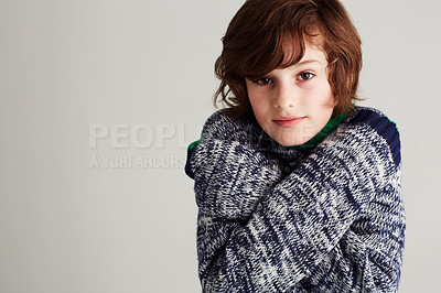 Buy stock photo Portrait, style and boy child in a studio with winter, casual and stylish outfit with positive attitude. Youth, clothes and young kid model with cool fashion posing and isolated by gray background.