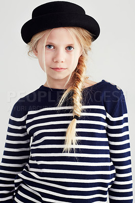 Buy stock photo Fashion, cute and portrait of child in a studio with casual, cool and stylish outfit and hat. Beautiful, youth and young girl kid model with trendy clothes for style isolated by white background