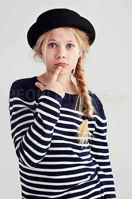 Buy stock photo Serious, confused and portrait of a girl with fashion isolated on a white background in studio. Doubt, confusion and a young child looking puzzled in fashionable, stylish and trendy clothes for youth
