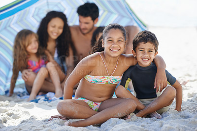 Buy stock photo Girl, boy with family on beach and smile in portrait, summer vacation with hug, bonding and love. People outdoor, holiday in Brazil with sand and sun, children happy for travel and adventure together