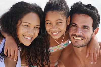 Buy stock photo Happy family, portrait and beach for bonding, vacation or outdoor holiday weekend together. Face of father, mother and child smile in hug for love, support or summer break by ocean coast in nature