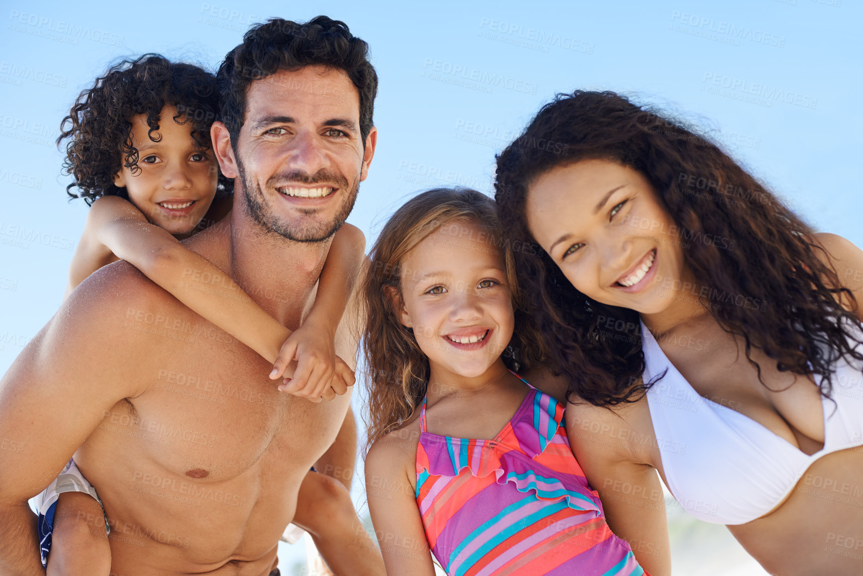 Buy stock photo Family, parents and children are happy on beach, portrait while on vacation for summer and sun in Brazil. Travel, adventure and blue sky with people in nature with smile for love and bonding outdoor