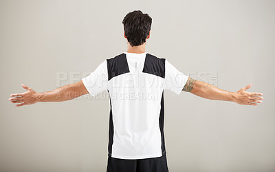 Buy stock photo Back, athlete or model for fitness results, wellness and health isolated on grey background in studio. Arms out, man or male person with progress in exercise, workout and training on a backdrop alone