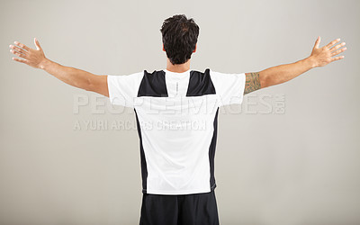 Buy stock photo Back, athlete or man for fitness results, wellness and health isolated on grey background in studio. Arms out, model or male person with progress in exercise, workout and training on a backdrop alone