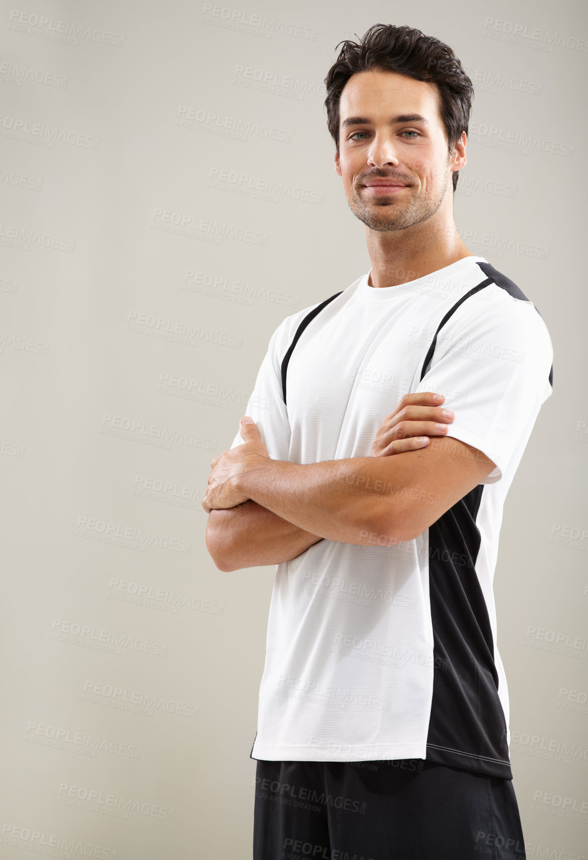 Buy stock photo Arms crossed, portrait or athlete in studio for fitness workout, sports exercise or healthy wellness. Mockup space, grey background or man ready to start training with confidence, discipline or pride