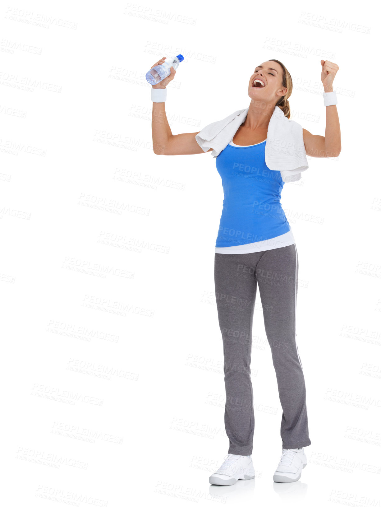 Buy stock photo Woman, fitness success and celebration in studio with water bottle for exercise, workout success or body goals. Excited model with fist, power and yes or energy for training on a white background