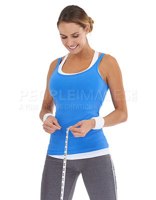 Buy stock photo Woman, stomach and measure tape for fitness, weight loss and health results or training progress in studio. Model check body or abdomen for exercise goals and diet or workout on a white background