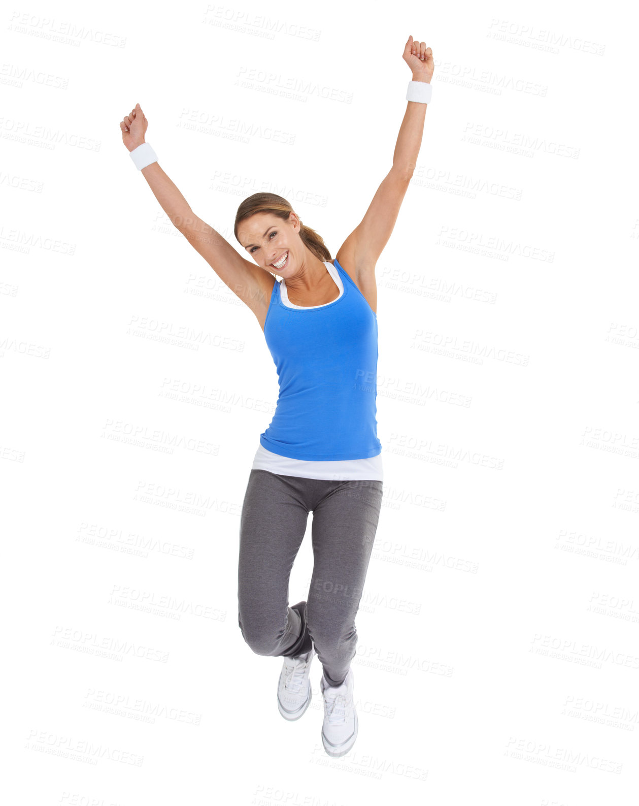 Buy stock photo Energetic young woman in sportswear jumping while isolated on white