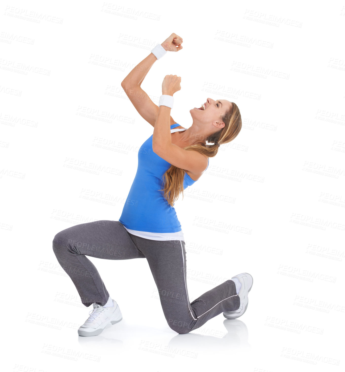 Buy stock photo Excited woman, fitness and fist pump in celebration for winning isolated on a white studio background. Female person or athlete smile in relief for prize, achievement or good news on mockup space