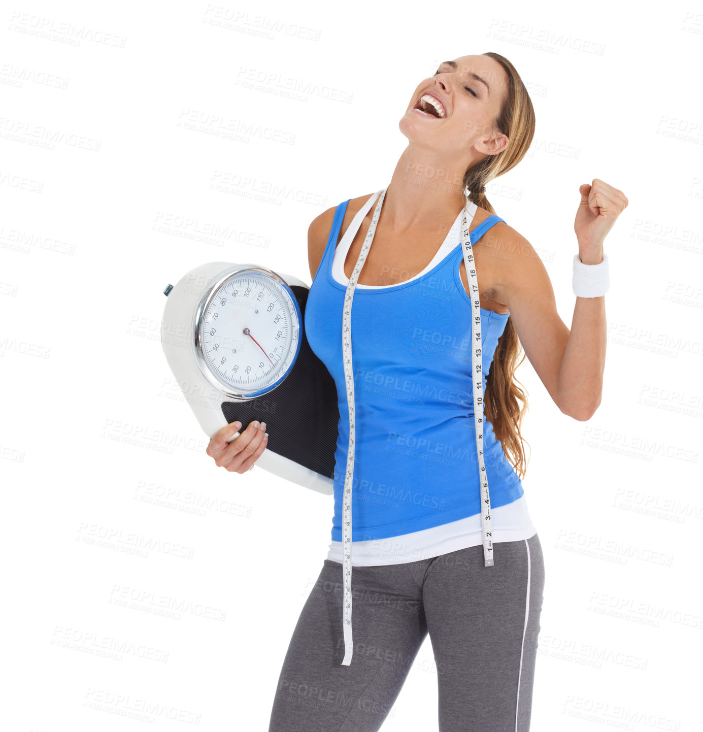 Buy stock photo Young woman in sportswear holding a scale and smiling while isolated on white
