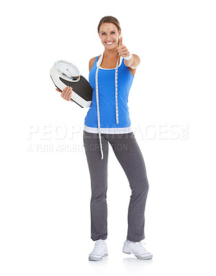 Buy stock photo Woman thumbs up, fitness scale and measure tape in studio for weight loss, health goals and like, ok or yes. Portrait of happy model with workout results, success and feedback on a white background