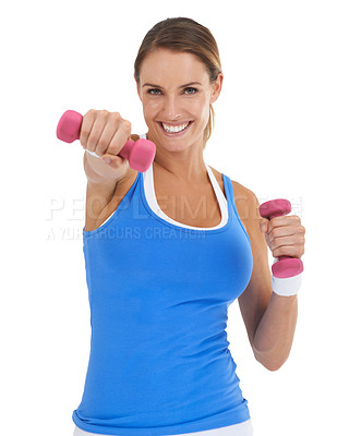 Buy stock photo Fit young woman smiling while using dumbbells against a white background