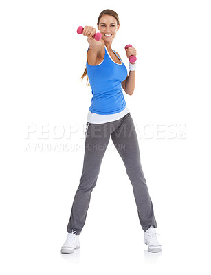 Buy stock photo Fit young woman smiling while using dumbbells against a white background