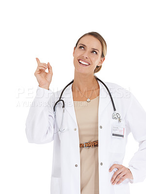 Buy stock photo Happy woman, portrait or doctor pointing up to ideas at mockup space on white background in studio. Marketing, advertising or nurse thinking of medical healthcare information, wellness or advice