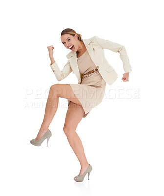 Buy stock photo A playful businesswoman making a gesture of victory against a white background